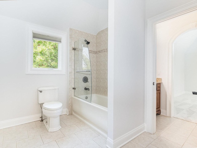 full bathroom with tile patterned flooring, baseboards, toilet, and shower / bathtub combination