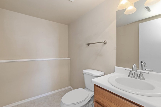 bathroom featuring baseboards, visible vents, toilet, tile patterned flooring, and vanity