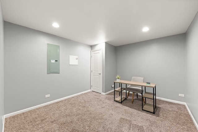 office space featuring recessed lighting, baseboards, electric panel, and carpet flooring