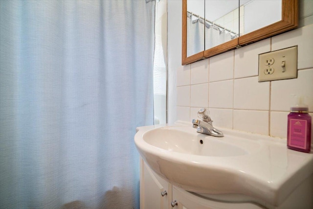 full bathroom with tile walls and backsplash