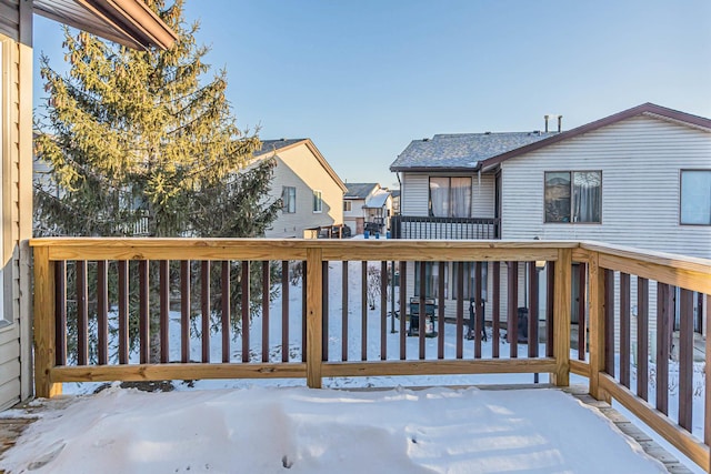 view of snow covered deck