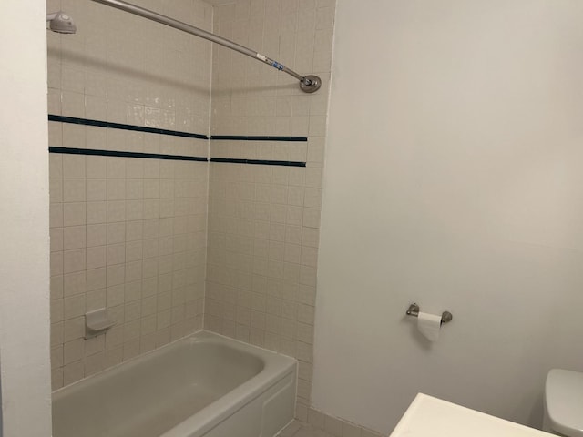 bathroom with toilet and shower / bathtub combination