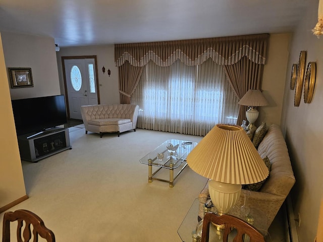 living area featuring carpet