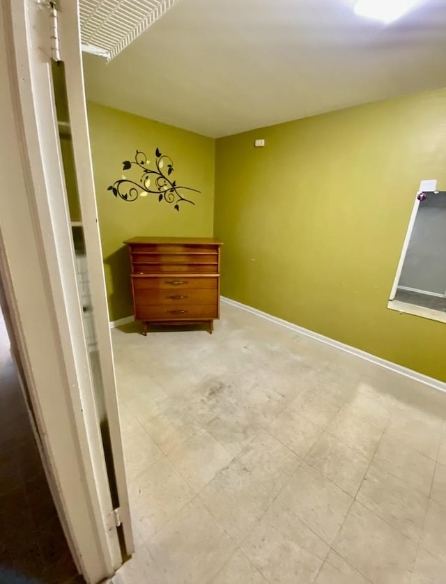 unfurnished bedroom featuring baseboards