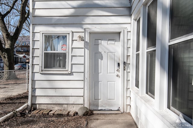 property entrance featuring fence