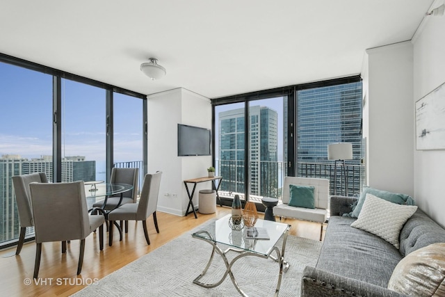 225 N Columbus Dr Unit 5610, Chicago, IL 60601 - living area featuring a wall of windows and wood finished floors
