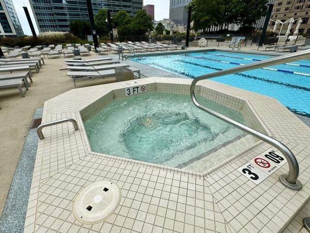 225 N Columbus Dr Unit 5610, Chicago, IL 60601 - community pool featuring a patio and a hot tub