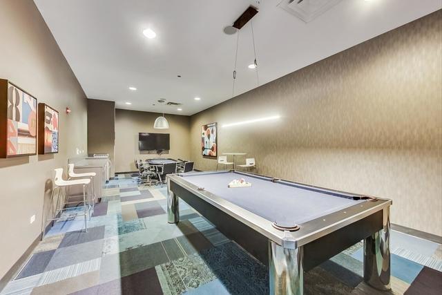 225 N Columbus Dr Unit 5610, Chicago, IL 60601 - playroom featuring recessed lighting, baseboards, billiards table, and wallpapered walls