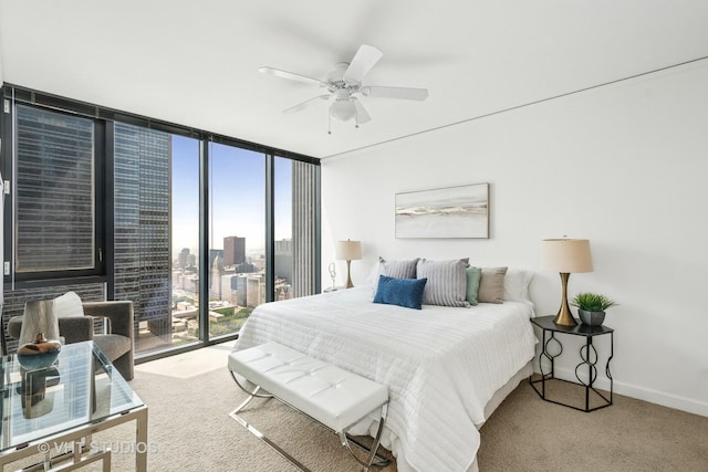 225 N Columbus Dr Unit 5610, Chicago, IL 60601 - carpeted bedroom featuring a wall of windows, baseboards, and ceiling fan