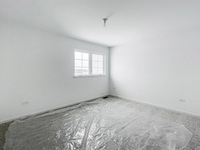 1571 Glenbrooke Ln, New Lenox, IL 60451 - spare room featuring baseboards