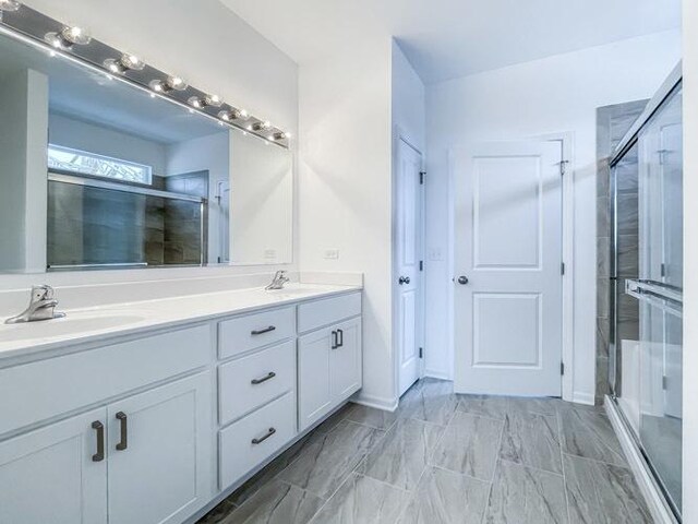 1571 Glenbrooke Ln, New Lenox, IL 60451 - full bathroom featuring double vanity, a sink, and a shower stall