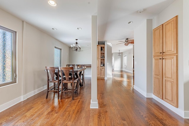 dining room with plenty of natural light and wood finished floors