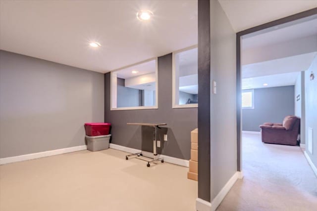 interior space featuring carpet, baseboards, and recessed lighting