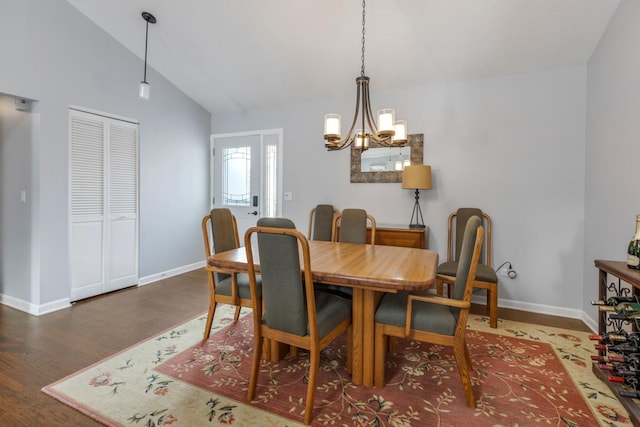 dining space with vaulted ceiling, dark wood-type flooring, baseboards, and a notable chandelier