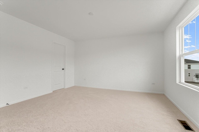 1121 Girard Ave, Des Plaines, IL 60018 - unfurnished room featuring light colored carpet and baseboards