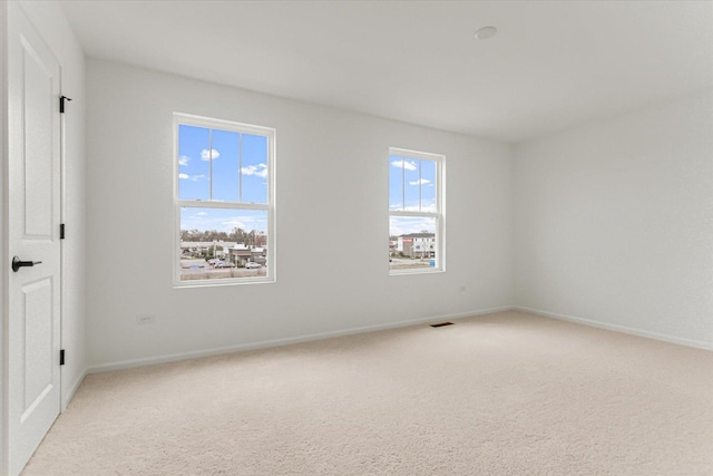 1121 Girard Ave, Des Plaines, IL 60018 - carpeted spare room featuring baseboards