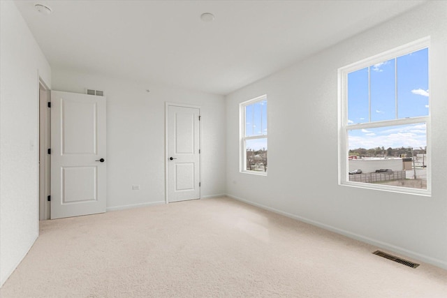 1121 Girard Ave, Des Plaines, IL 60018 - carpeted empty room featuring baseboards