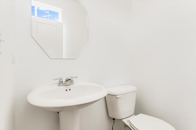 1121 Girard Ave, Des Plaines, IL 60018 - half bath featuring toilet and a sink