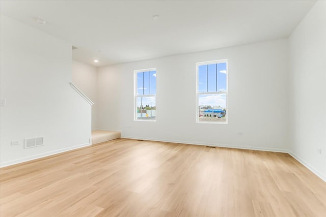 1121 Girard Ave, Des Plaines, IL 60018 - unfurnished room with light wood-type flooring and baseboards