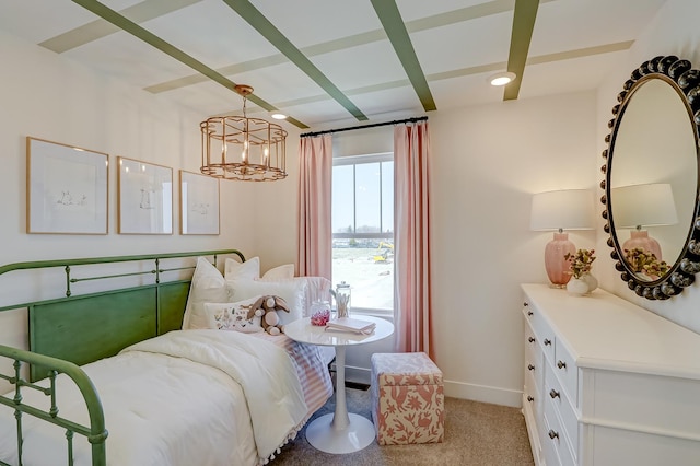 bedroom with beam ceiling, light carpet, and baseboards