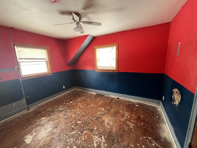 unfurnished room with visible vents and ceiling fan