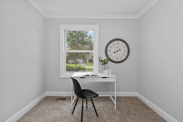 carpeted office space featuring baseboards, visible vents, and crown molding