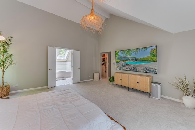 bedroom featuring high vaulted ceiling, carpet floors, a skylight, baseboards, and beamed ceiling