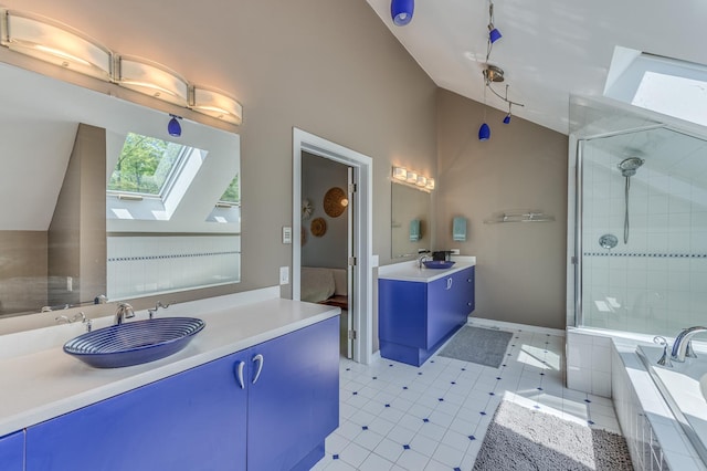 full bathroom featuring a garden tub, two vanities, lofted ceiling with skylight, a sink, and tiled shower