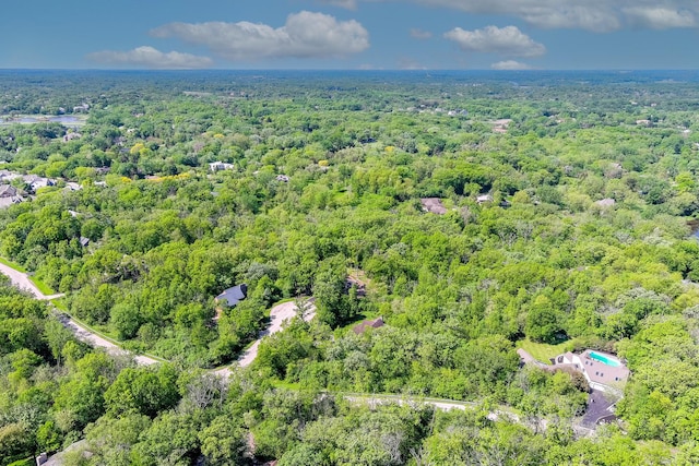 aerial view featuring a view of trees