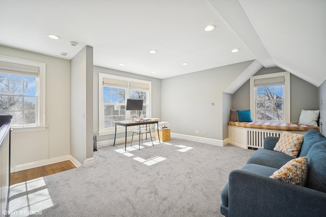 interior space featuring baseboards, radiator heating unit, carpet, vaulted ceiling, and recessed lighting