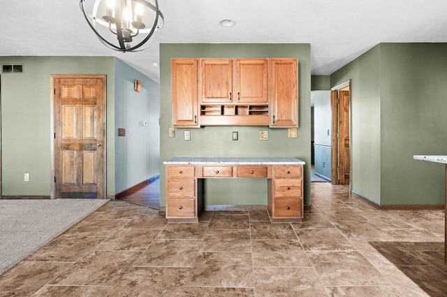 kitchen with open shelves, light countertops, visible vents, a chandelier, and baseboards