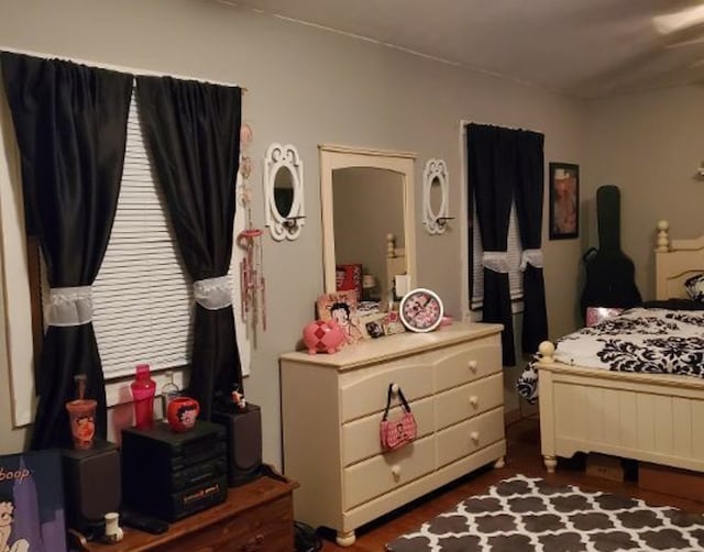 bedroom featuring dark wood-type flooring