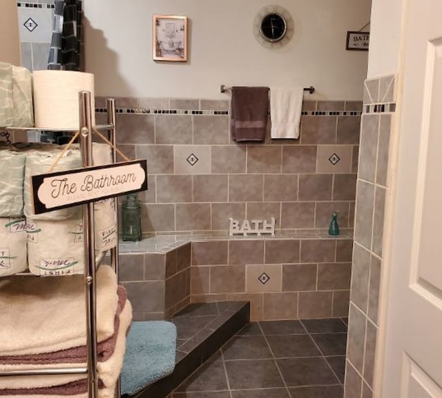 full bathroom with tile patterned floors