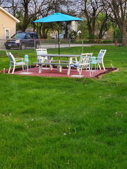 view of yard with a patio and fence