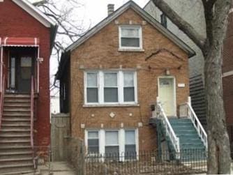 view of front of property with brick siding