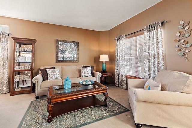 living room featuring light carpet