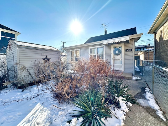 view of front of property with fence