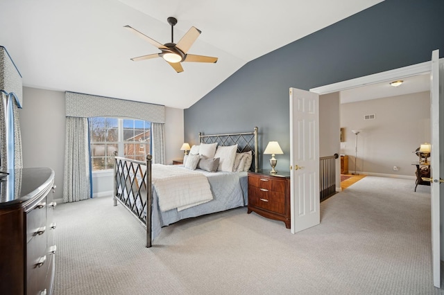 bedroom featuring light carpet, visible vents, baseboards, ceiling fan, and vaulted ceiling