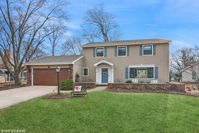 view of front of property with concrete driveway, a garage, and a front yard