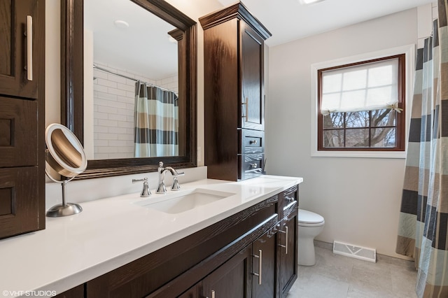 full bathroom with visible vents, toilet, a shower with curtain, tile patterned flooring, and vanity