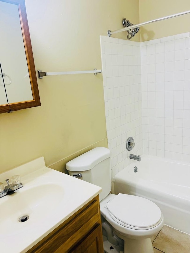 full bath with toilet,  shower combination, tile patterned flooring, and vanity