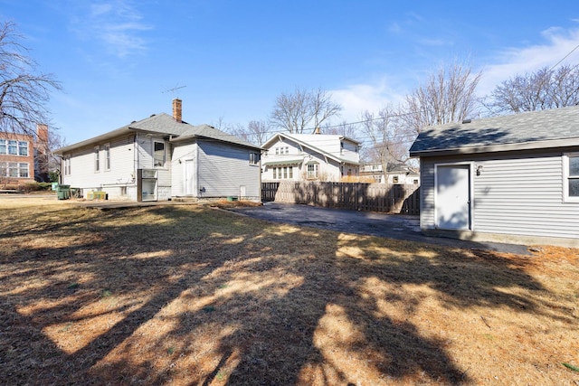 411 N Arlington Heights Rd, Arlington Heights, IL 60004 - rear view of property featuring a chimney