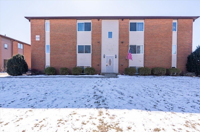 view of front of home with brick siding