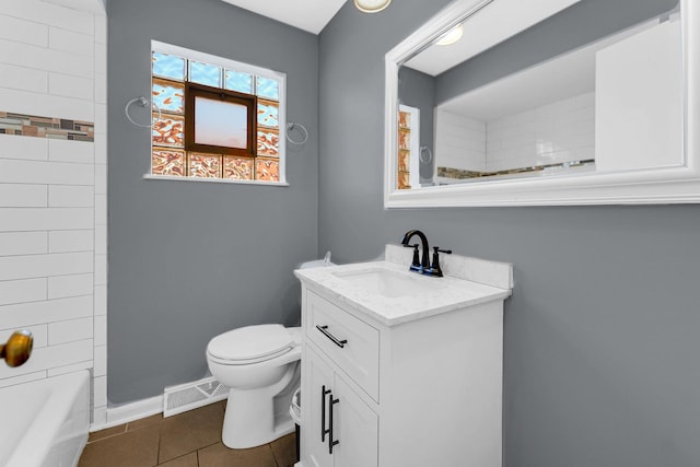 bathroom with visible vents, baseboards, toilet, tile patterned flooring, and vanity