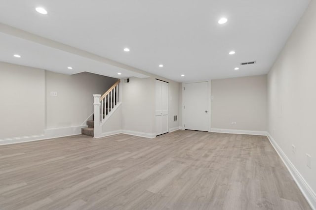 interior space featuring stairs, recessed lighting, visible vents, and light wood-style floors