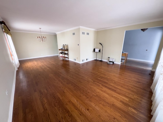 unfurnished living room featuring dark wood-style flooring, baseboards, and an inviting chandelier