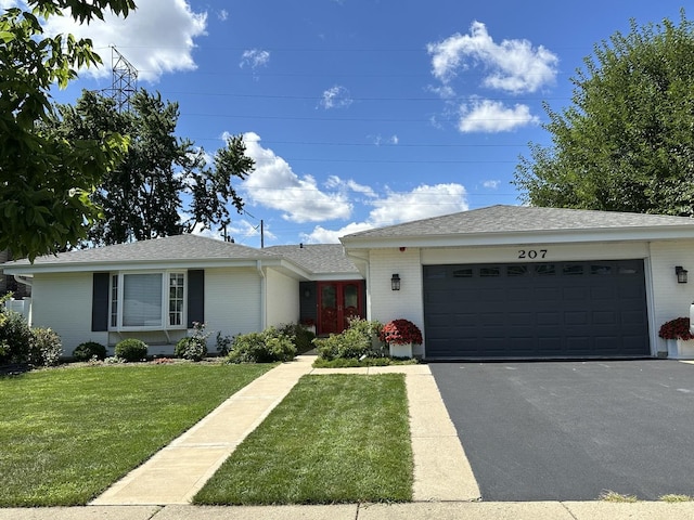 single story home with a garage, driveway, a shingled roof, a front lawn, and brick siding