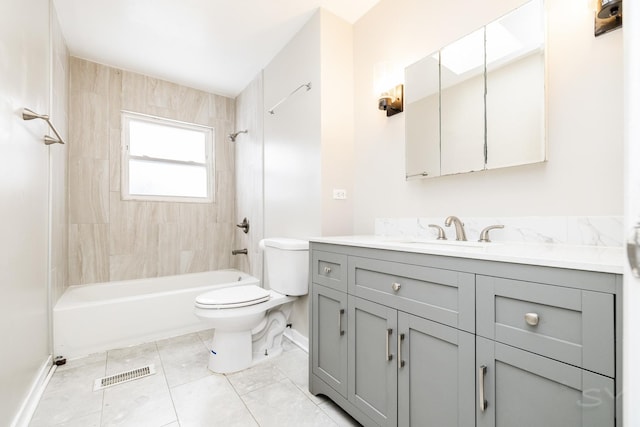 full bathroom featuring toilet, visible vents, vanity, bathing tub / shower combination, and baseboards