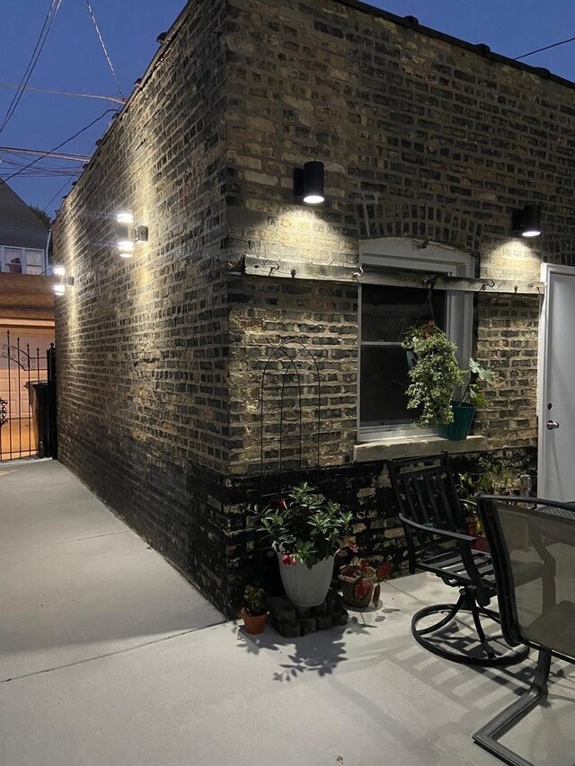 snow covered patio with fence