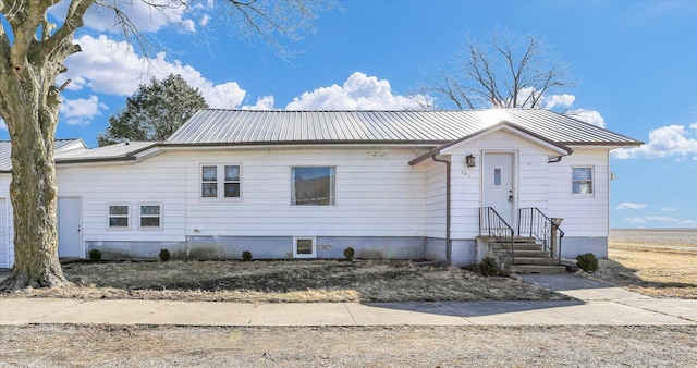 view of front of property with metal roof